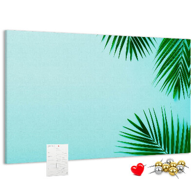Panou de pluta Frunze tropicale pe fundal albastru