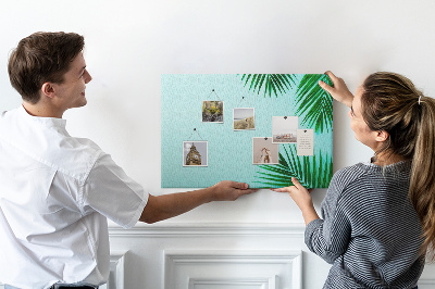 Panou de pluta Frunze tropicale pe fundal albastru