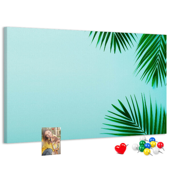 Panou de pluta Frunze tropicale pe fundal albastru