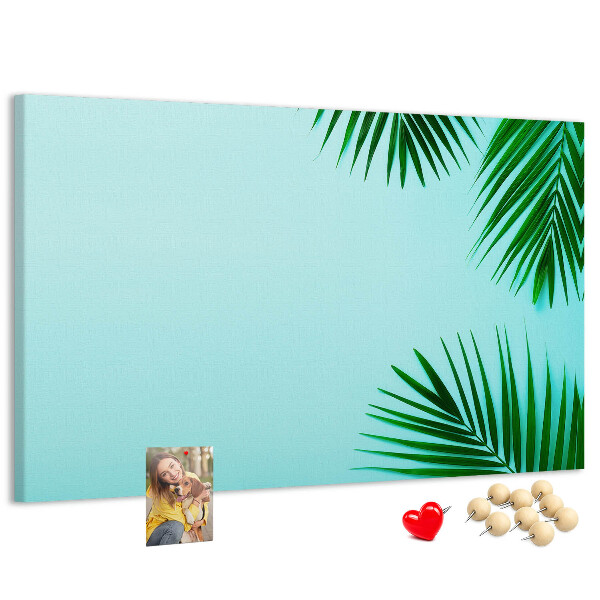 Panou de pluta Frunze tropicale pe fundal albastru