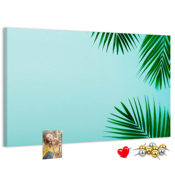 Panou de pluta Frunze tropicale pe fundal albastru
