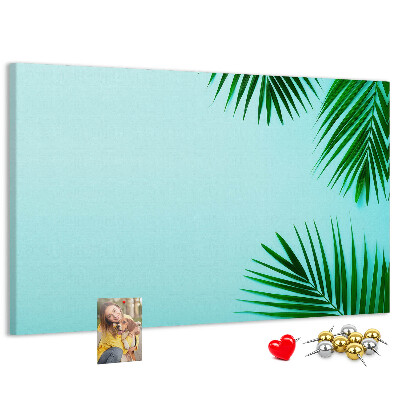 Panou de pluta Frunze tropicale pe fundal albastru
