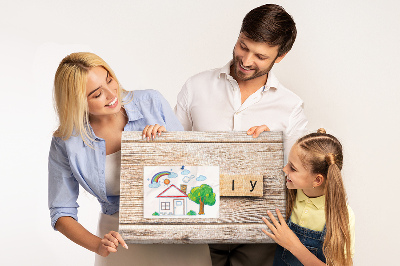 Panou din pluta Familie pe fundalul unei plăci de lemn