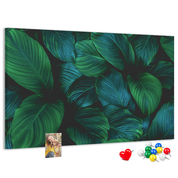Panou din pluta Frunze tropicale pe un fundal întunecat