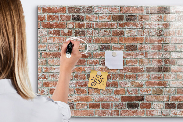 Tablă cu marker Placă foto pe un perete de cărămidă