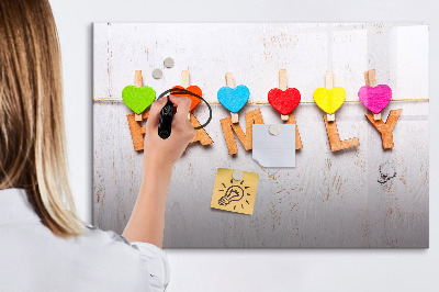Tablă cu marker Amintiri colorate pe un șir de fotografii